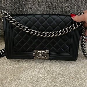 Brand New (never used but out of box) Chanel Cross body purse.